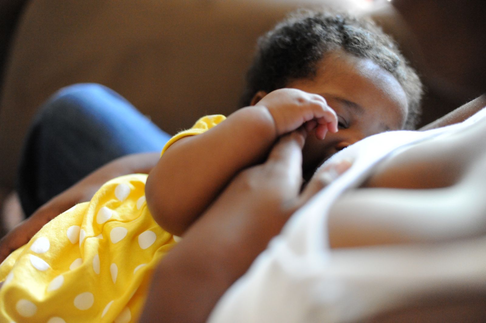 A mother breastfeeding her baby